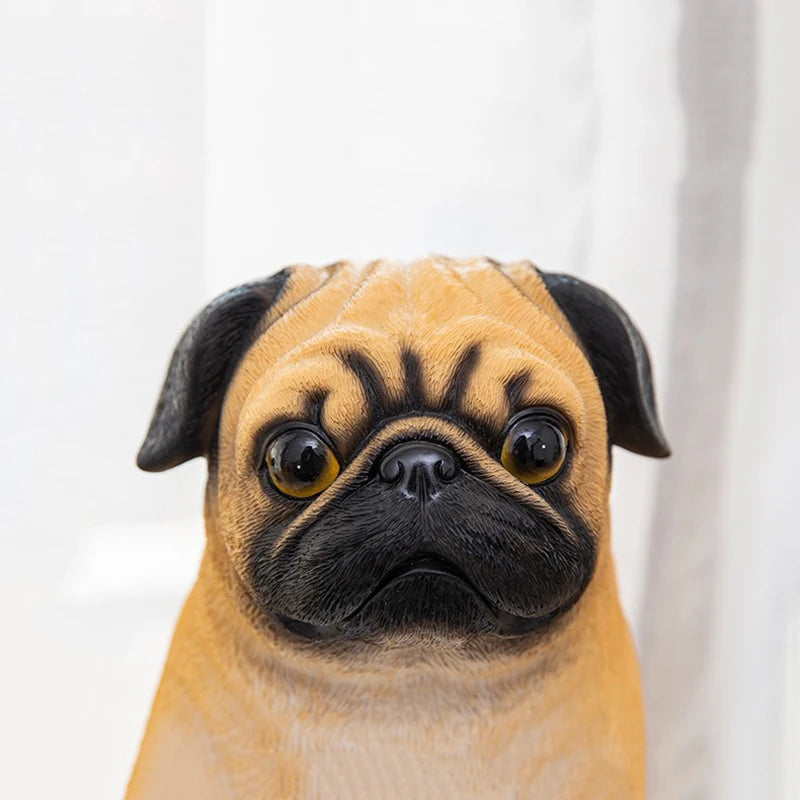 Pug holding a cup Statue